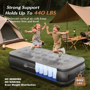 Children jumping on a JUITOY twin air mattress with 440 lb support